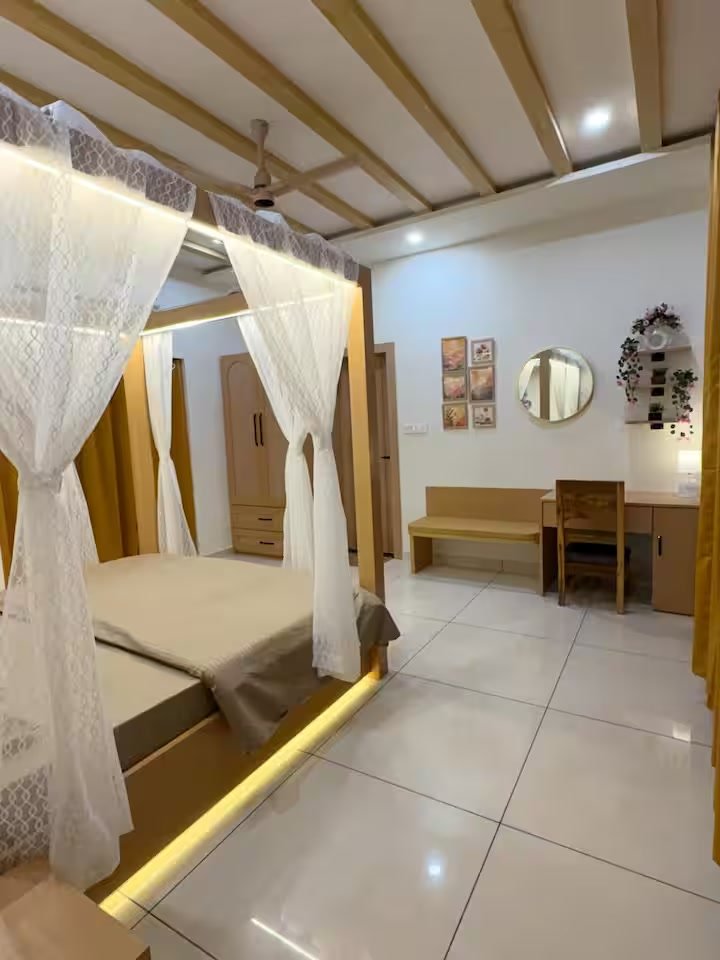 Bedroom 4 — AC bedroom with closet, attached washroom with geyser, and a study table with small sitting